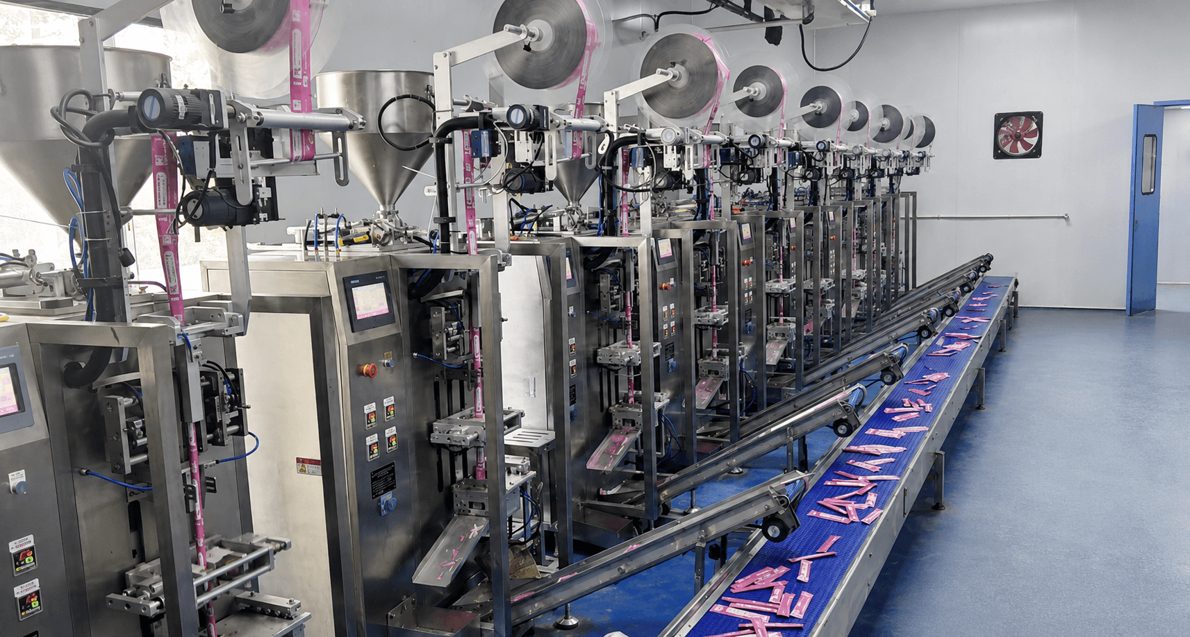YUHUA multi-machine packaging line with integrated product conveying system