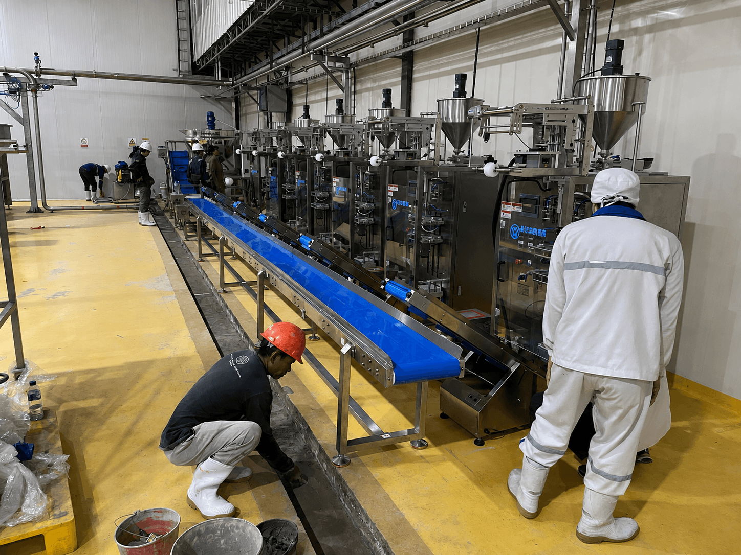 YUHUA packaging line installation and commissioning at a production facility
